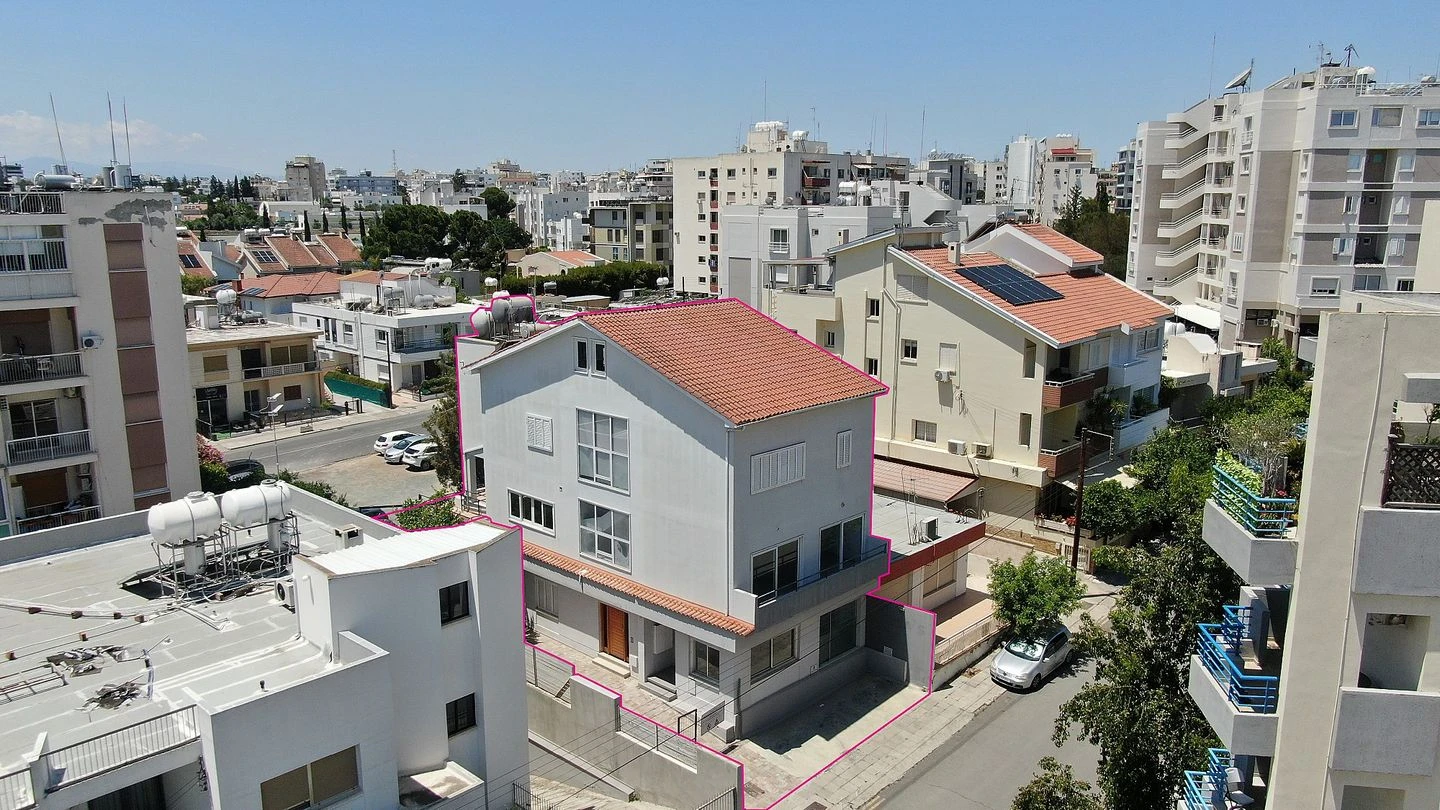 Three storey semidetached mixed use building with shop and attic in Strovolos Nicosia, image 1