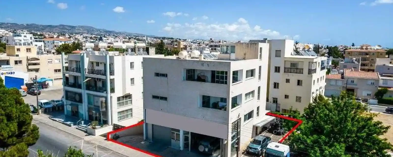 Three-storey mixed-use building in agios theodoros, paphos, image 1